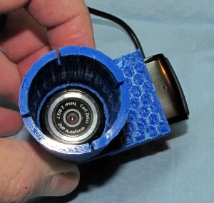 Camera in microscope adapter.